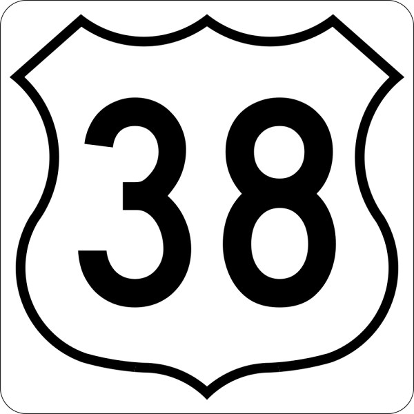 This picture shows the number thirty eight written in black inside a white badge symbol with a black outline.