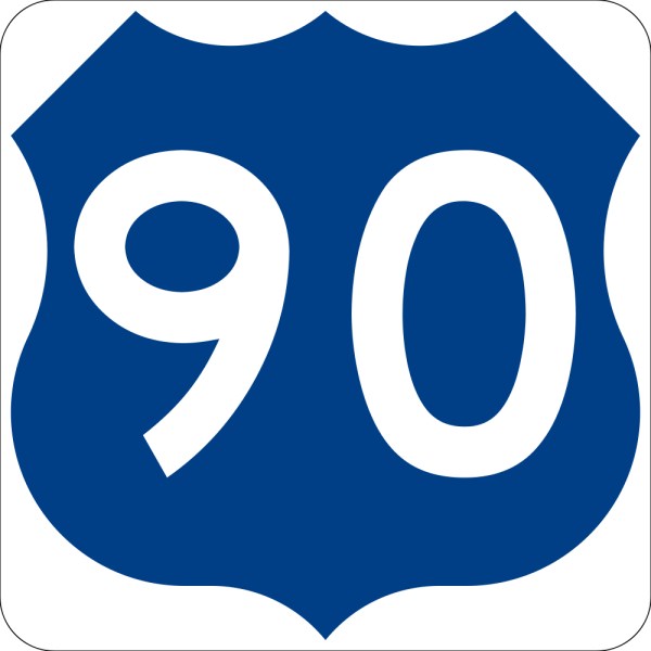 This picture shows the number 90 written in white inside a shield symbol.