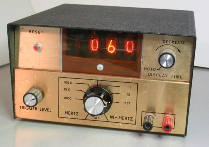 This photo shows the number 60 on an old frequency counter.