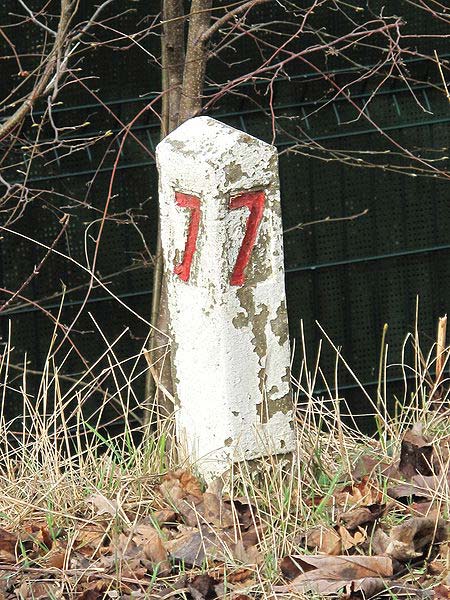 This photo shows the number 7 on an old marker post.